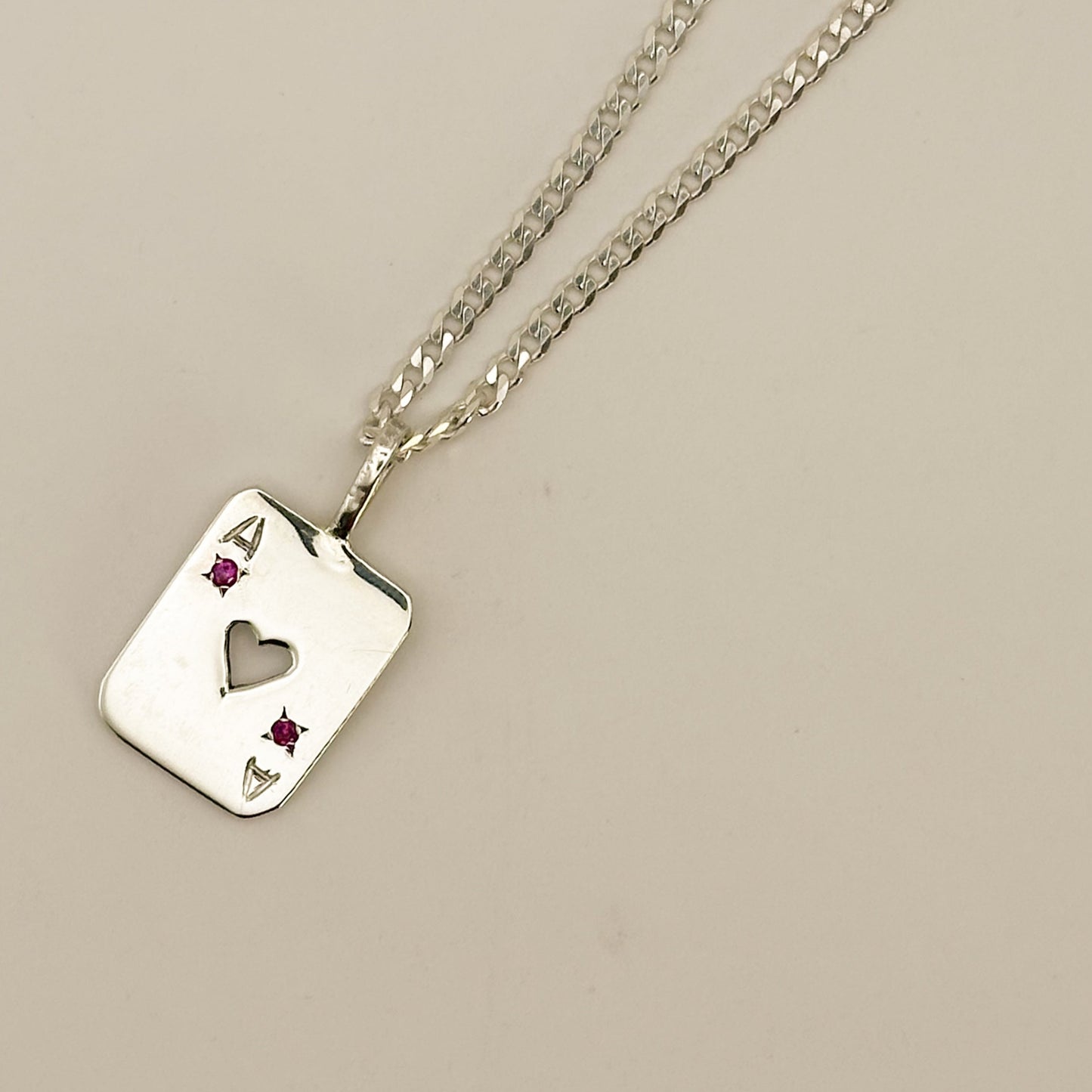 Dije de As de Corazón