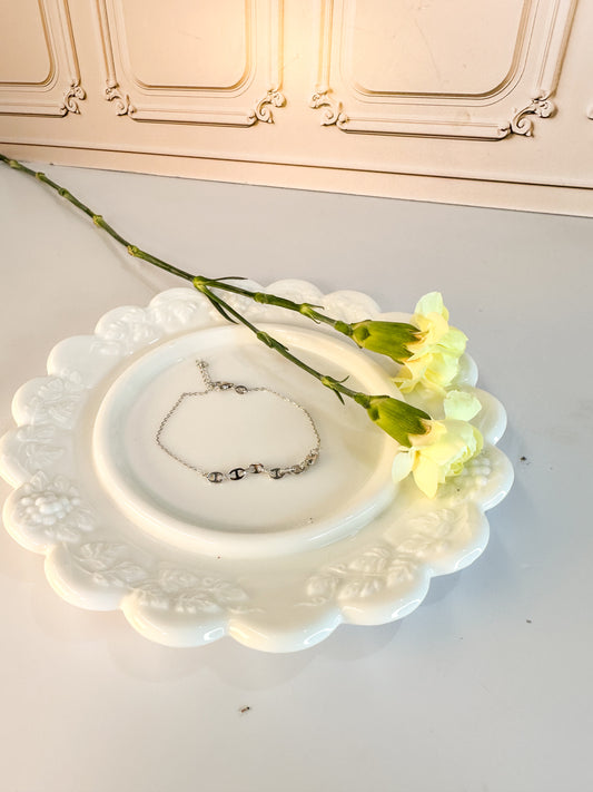 Pulsera con eslabones decorativos
