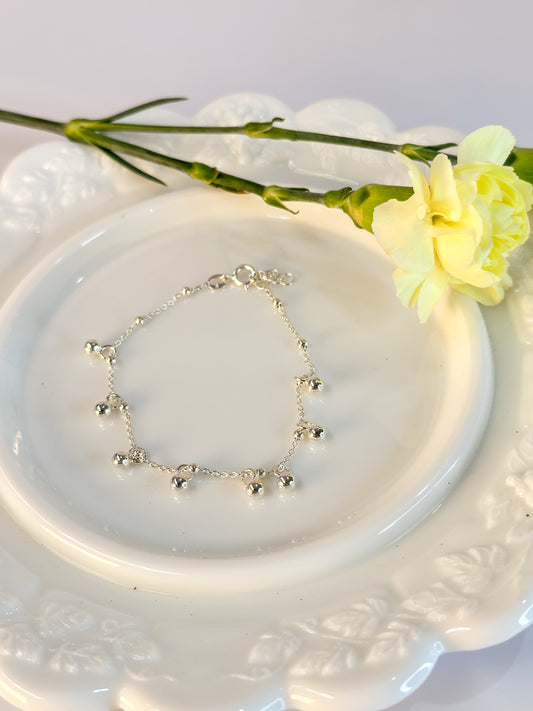 Pulsera con charm de balines